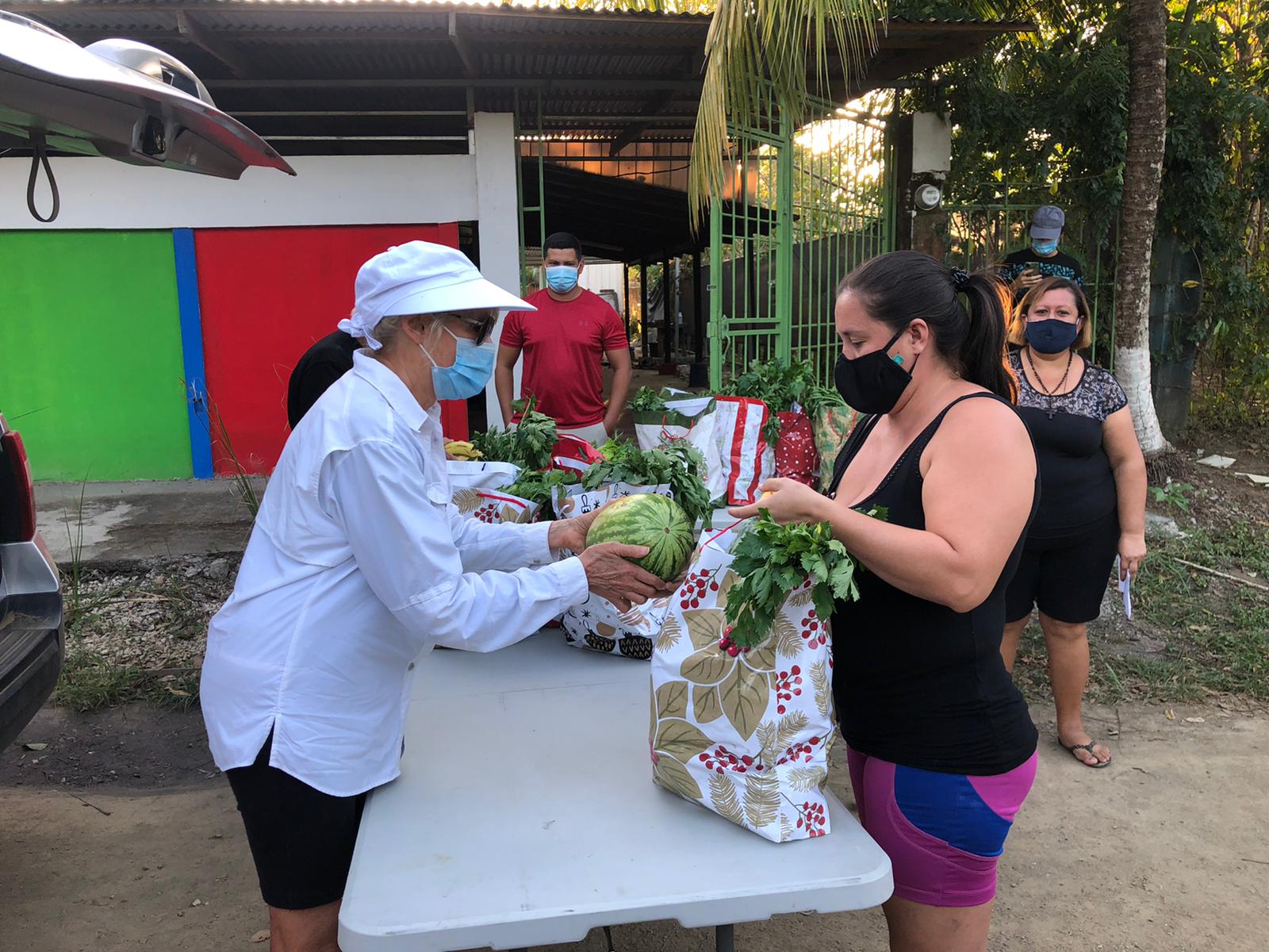 Trish donating food to families in need (1)